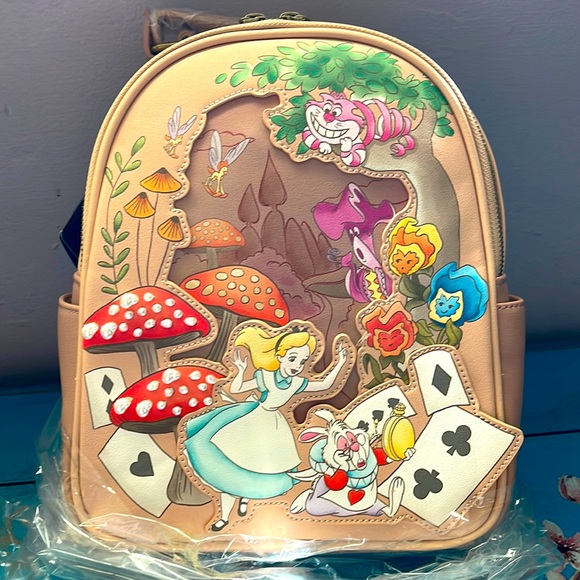 Loungefly Handbags - Loungefly Alice in wonderland mini backpack.